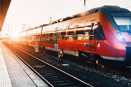 Train at station sunset